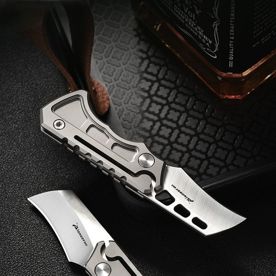 Titan Claw Mini EDC Folding Knife with 14C28N stainless steel and GR5 titanium handle.