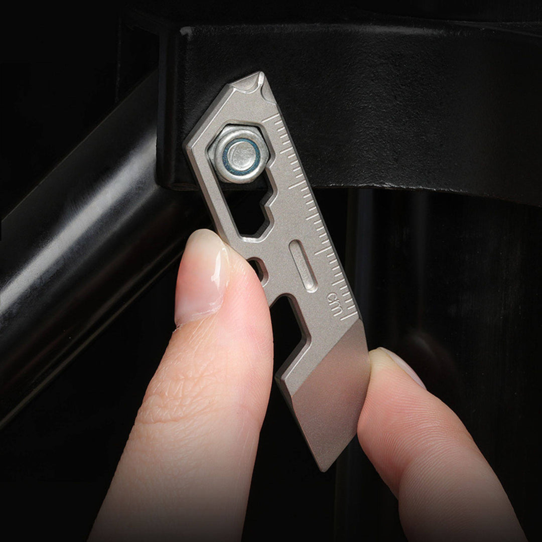 TC07D – Titanium Keychain Tool With Screwdriver, Opener, Ruler & Wrench