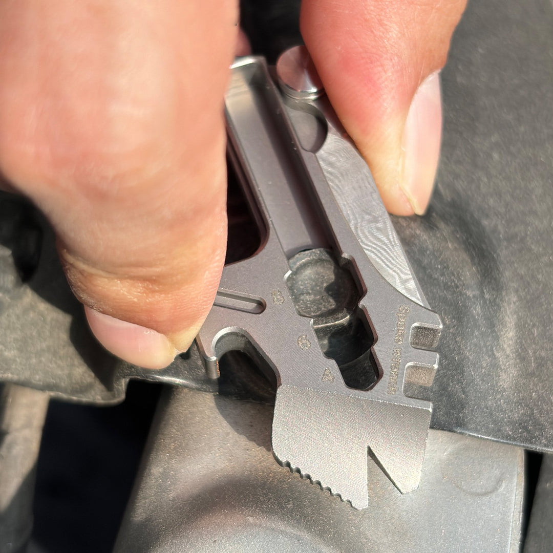 Iron Fist in a Velvet Glove:Titanium Keychain with Whistle, Damascus Knife & Bottle Opener