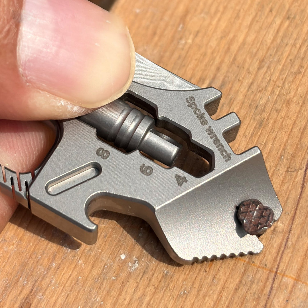 Iron Fist in a Velvet Glove:Titanium Keychain with Whistle, Damascus Knife & Bottle Opener