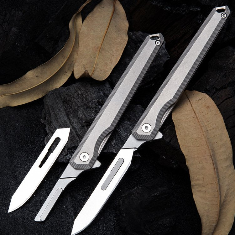 The Scalpelix:Titanium Bearing Replaceable Blade EDC Folding Knife