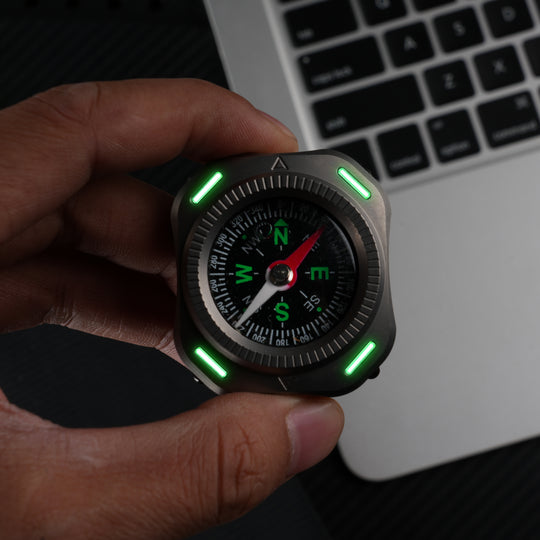 CompaX — A Titanium Compass with Multiple Carry Options