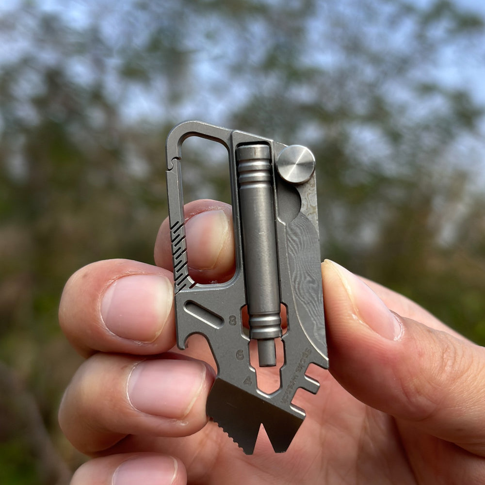 Iron Fist in a Velvet Glove:Titanium Keychain with Whistle, Damascus Knife & Bottle Opener
