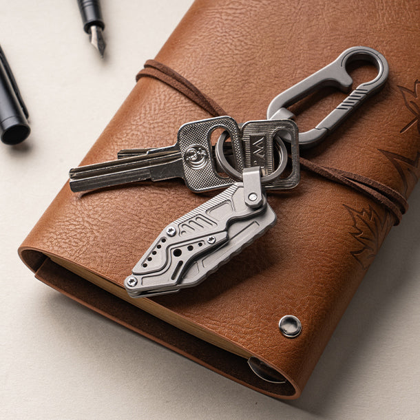 LINKFIN: A Compact Sliding-Link Knife for Everyday Use