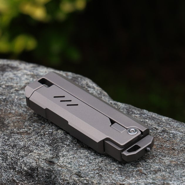 JetFlick – Gravity-Open Titanium Utility Knife with Quick-Change Blade