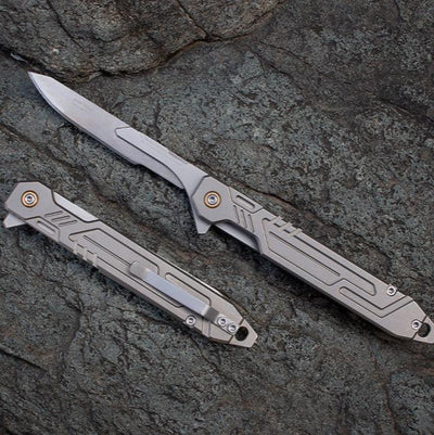 The TiFlip: Titanium Multifunction Flipper Scalpel Knife