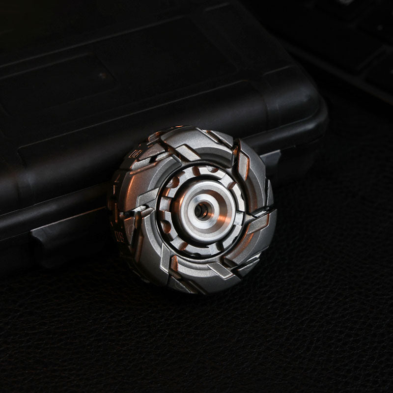 Metal mecha fidget spinner on black background — angled product shot