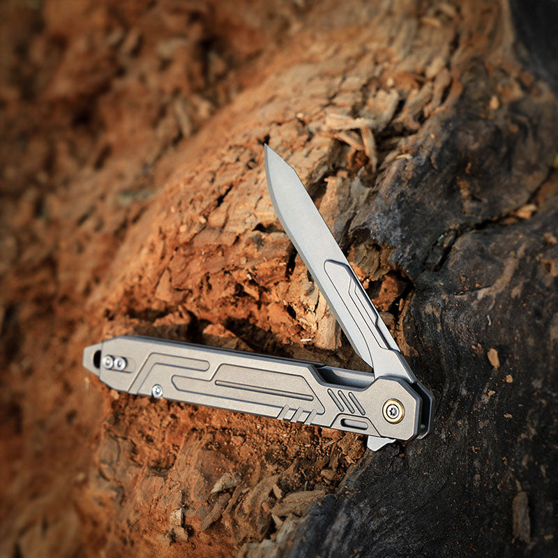 The TiFlip: Titanium Multifunction Flipper Scalpel Knife