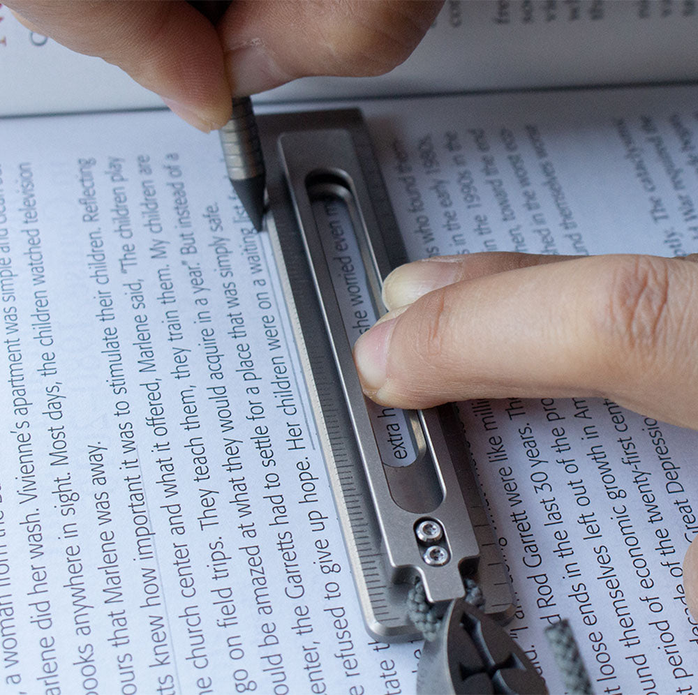 The BookBond Pen: Titanium Multitool Bookmark