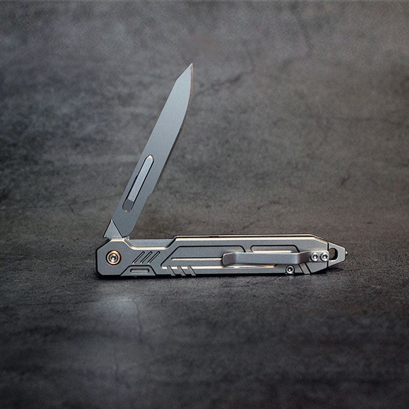 The TiFlip: Titanium Multifunction Flipper Scalpel Knife