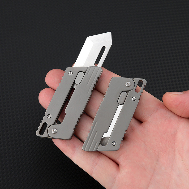 The Flick Ninja: Titanium Alloy Mini Knife with Unique Opening