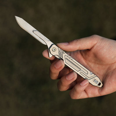 The TiFlip: Titanium Multifunction Flipper Scalpel Knife