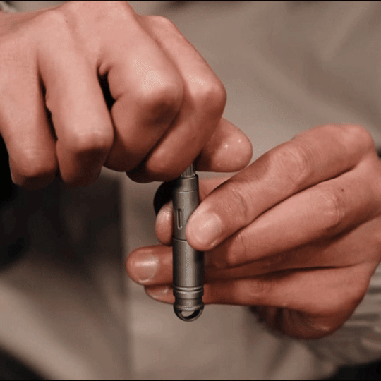 DartInk – Quick-Release Titanium Mini Pen & Knife