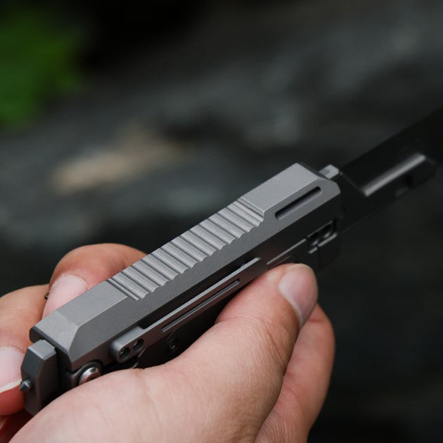JetFlick – Gravity-Open Titanium Utility Knife with Quick-Change Blade