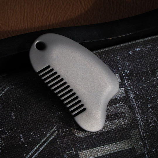 PebbleTouch: The Portable Titanium Muscle Scraper for Relief