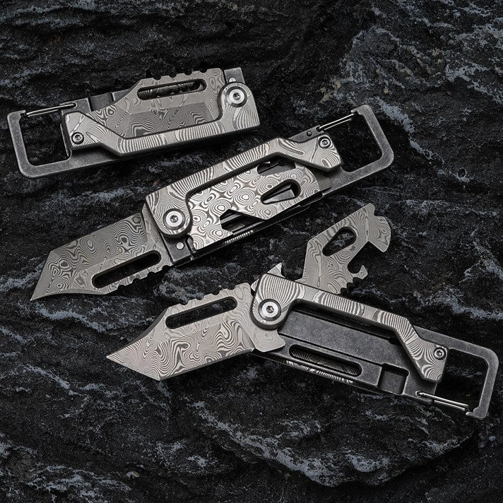 The Dual-Action Blade: 9-in-1 Damascus Keychain Folding Knife