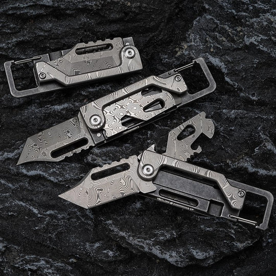 The Dual-Action Blade: 9-in-1 Damascus Keychain Folding Knife