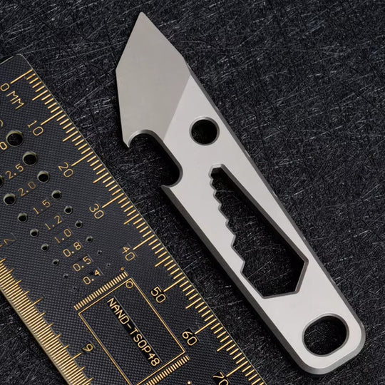 The SharkFin:Mini Titanium EDC  Multi-Tool Pry Bar