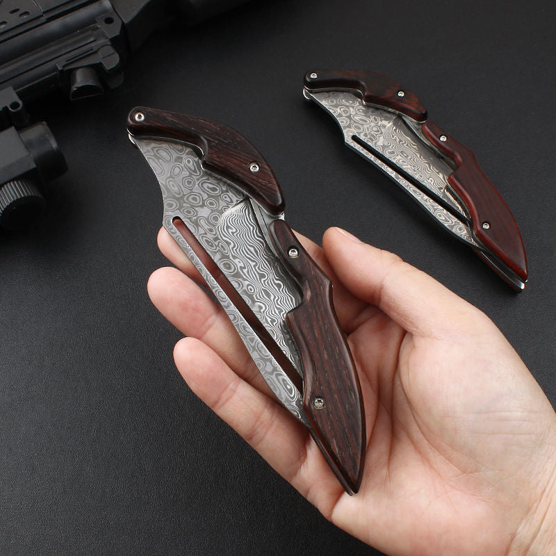 Forged for the Wild: Damascus Steel Camp Mechanical Lock Folding Knife