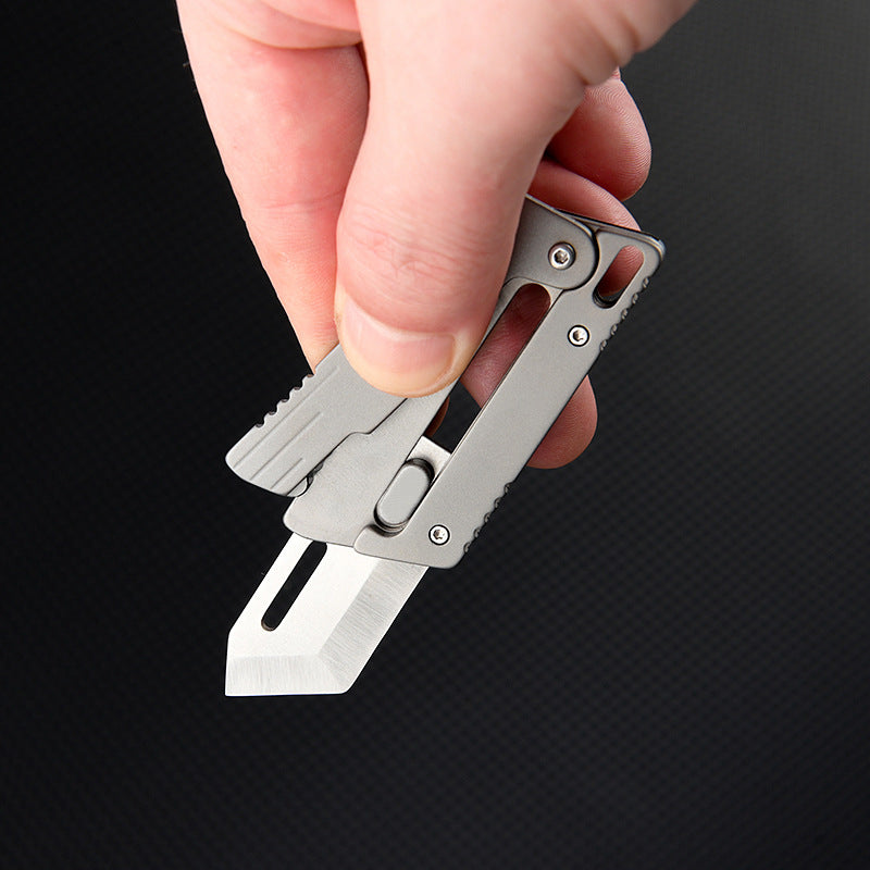 The Flick Ninja: Titanium Alloy Mini Knife with Unique Opening