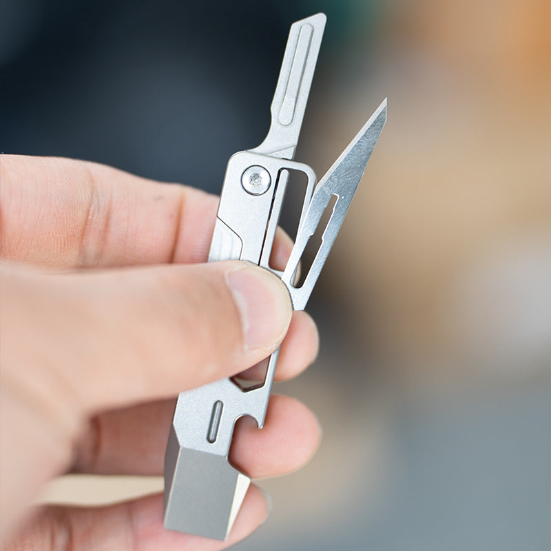 The Baton: 9-in-1 Titanium EDC Pocket Tool Keychain Folding Knife