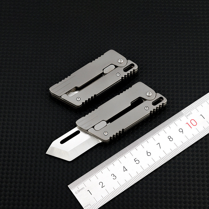 The Flick Ninja: Titanium Alloy Mini Knife with Unique Opening